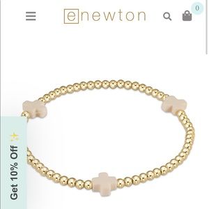 Enewton off white cross bracelet